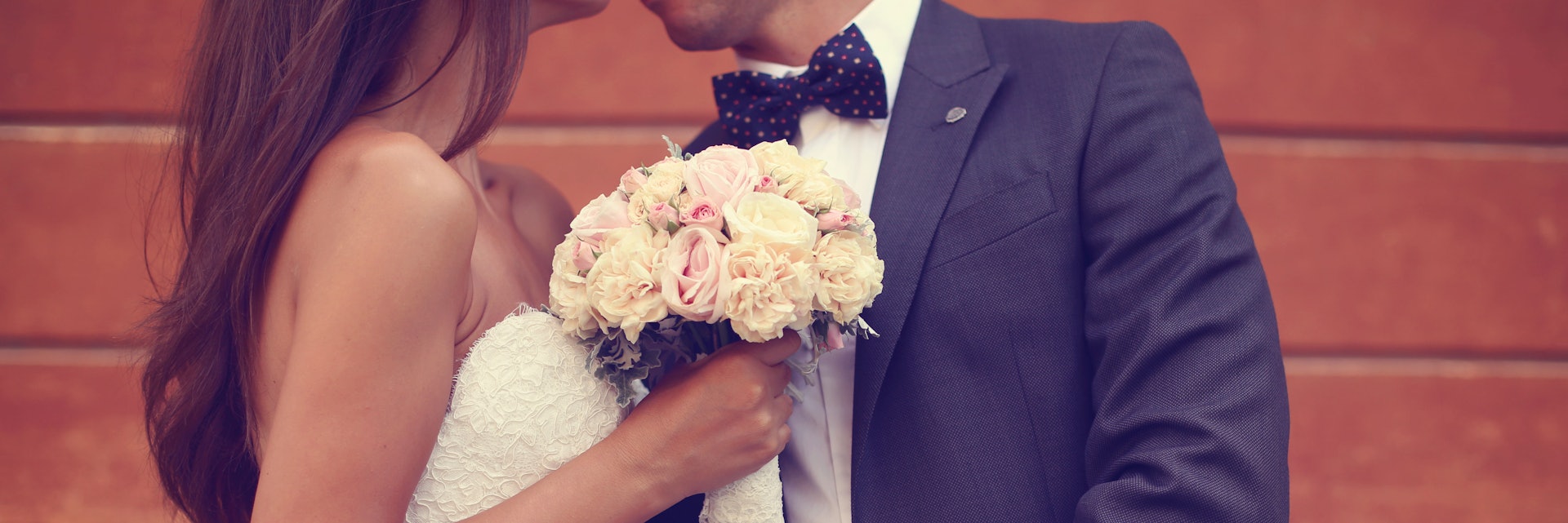 married couple with flower boquet